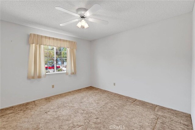 7621 Alston Ave, Hesperia, CA 92345 - carpeted empty room featuring a textured ceiling and ceiling fan