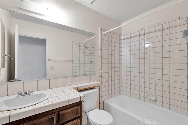 7621 Alston Ave, Hesperia, CA 92345 - full bathroom with vanity, toilet, shower / tub combination, and decorative backsplash