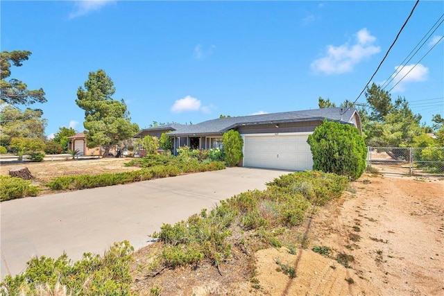 7621 Alston Ave, Hesperia, CA 92345 - view of front of house featuring an attached garage and concrete driveway