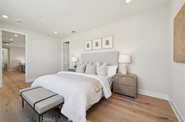 56 Chasma, Irvine, CA 92618 - bedroom featuring recessed lighting, light wood-style floors, and baseboards