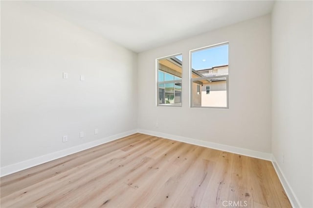 56 Chasma, Irvine, CA 92618 - empty room with wood finished floors and baseboards