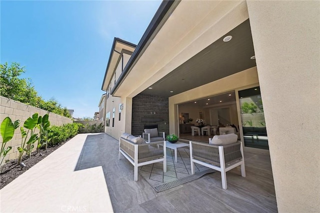 56 Chasma, Irvine, CA 92618 - view of patio / terrace featuring a fenced backyard and an outdoor hangout area