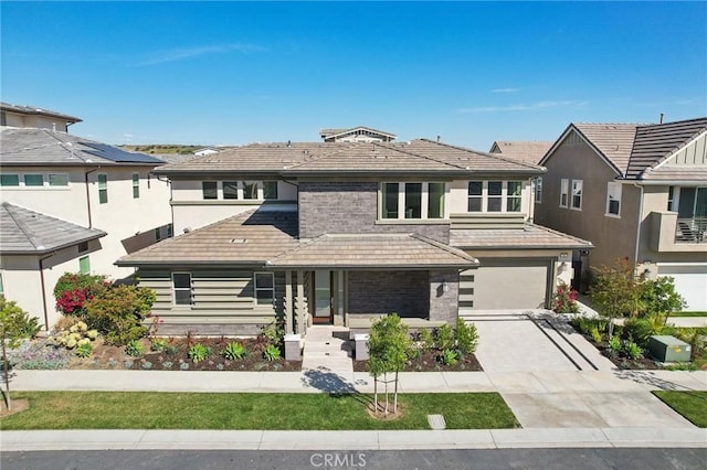 56 Chasma, Irvine, CA 92618 - view of front facade with an attached garage and driveway