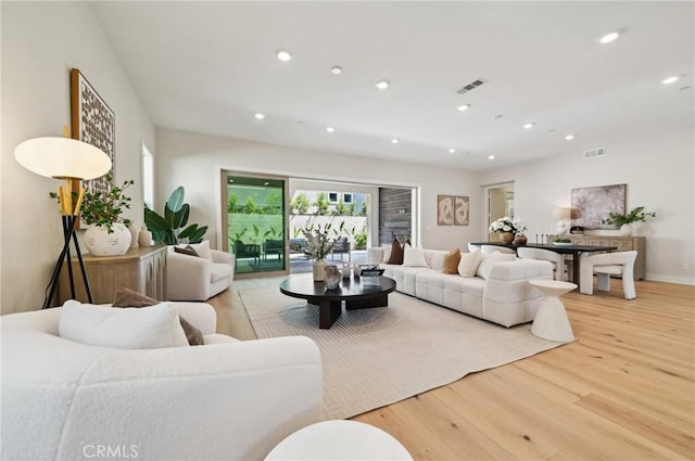 56 Chasma, Irvine, CA 92618 - living area featuring wood finished floors, recessed lighting, and baseboards