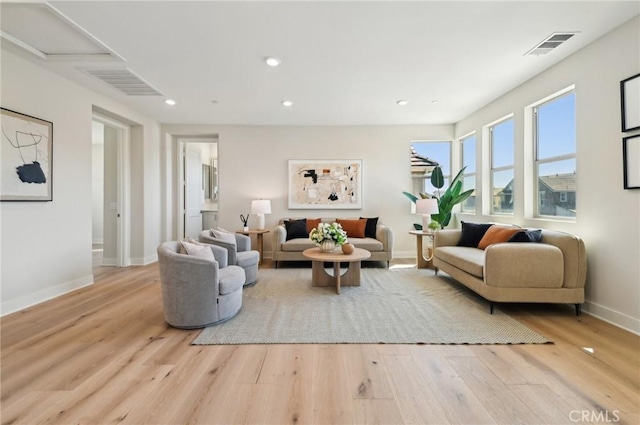 56 Chasma, Irvine, CA 92618 - living area with wood finished floors, baseboards, and recessed lighting