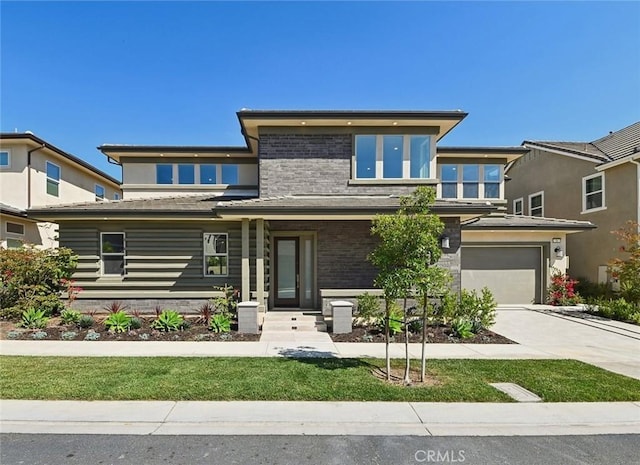 56 Chasma, Irvine, CA 92618 - prairie-style home featuring an attached garage and driveway