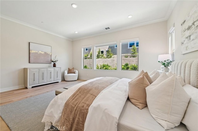56 Chasma, Irvine, CA 92618 - bedroom featuring wood finished floors, ornamental molding, baseboards, and recessed lighting