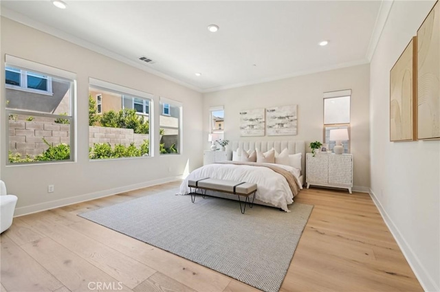56 Chasma, Irvine, CA 92618 - bedroom featuring ornamental molding, light wood-style floors, baseboards, and recessed lighting
