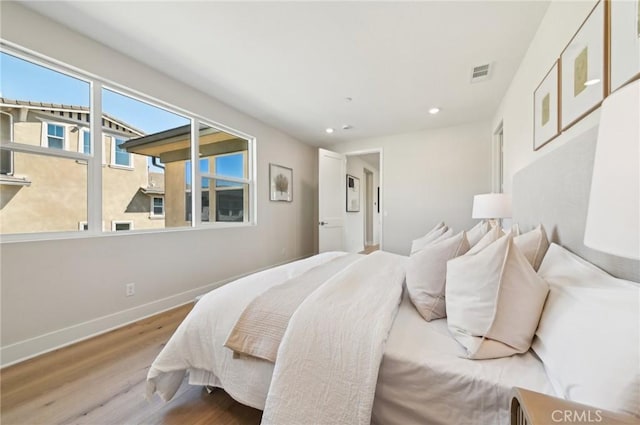 56 Chasma, Irvine, CA 92618 - bedroom with wood finished floors, recessed lighting, and baseboards