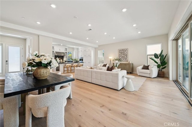 56 Chasma, Irvine, CA 92618 - living room featuring light wood finished floors and recessed lighting