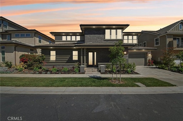 56 Chasma, Irvine, CA 92618 - view of front facade with driveway and an attached garage