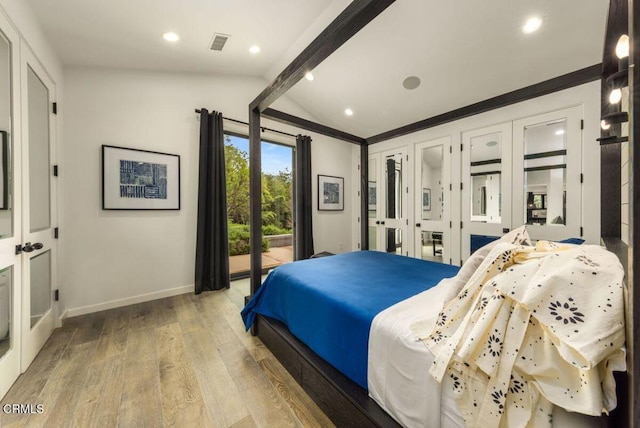 bedroom with baseboards, access to exterior, wood finished floors, and recessed lighting