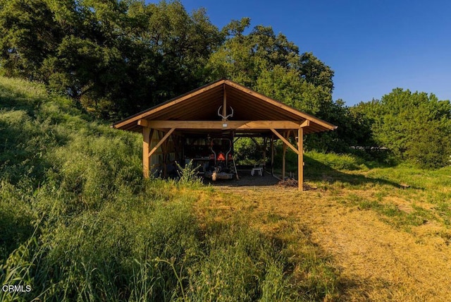 view of home's community featuring a carport