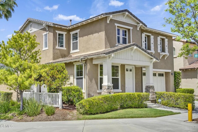 40197 Gallatin Ct, Temecula, CA 92591 - view of front of house with an attached garage, stucco siding, and fence