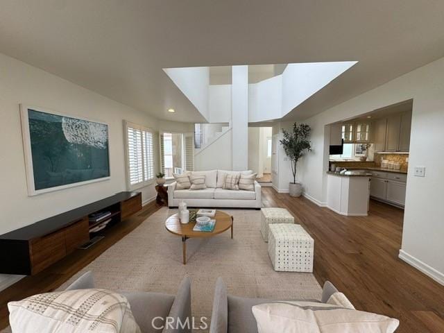 854 Cypress Ave, Hermosa Beach, CA 90254 - living room featuring baseboards and dark wood-type flooring