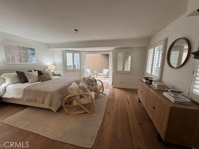 854 Cypress Ave, Hermosa Beach, CA 90254 - bedroom with wood finished floors and multiple windows