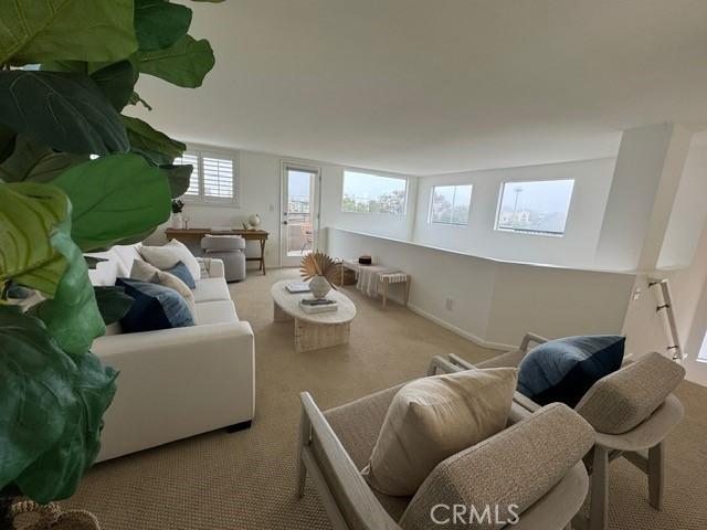 854 Cypress Ave, Hermosa Beach, CA 90254 - carpeted living area featuring baseboards