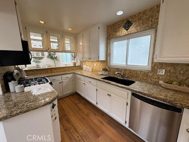 854 Cypress Ave, Hermosa Beach, CA 90254 - kitchen featuring dishwasher, a sink, range, white cabinetry, and recessed lighting