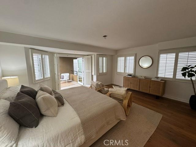 854 Cypress Ave, Hermosa Beach, CA 90254 - bedroom featuring baseboards and wood finished floors