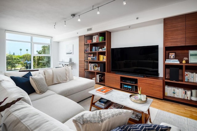 living area with wood finished floors