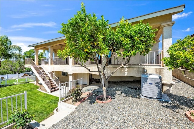 23651 Cruise Circle Dr, Canyon Lake, CA 92587 - view of front of house featuring stairs, a patio area, and stucco siding
