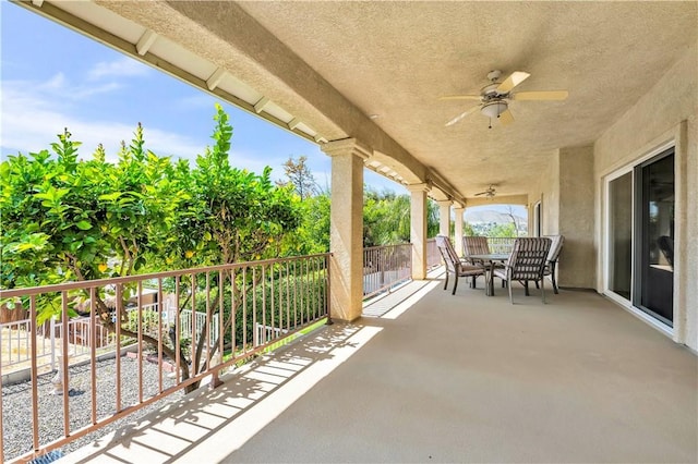 23651 Cruise Circle Dr, Canyon Lake, CA 92587 - view of patio / terrace with a ceiling fan, a balcony, and outdoor dining space