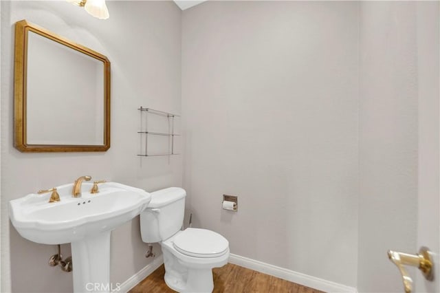 23651 Cruise Circle Dr, Canyon Lake, CA 92587 - bathroom featuring wood finished floors, baseboards, and toilet
