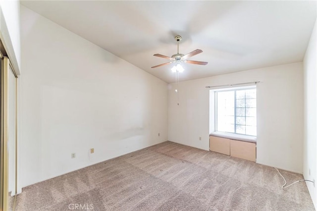 1434 Senator Way, San Jacinto, CA 92583 - unfurnished bedroom with light carpet, lofted ceiling, and ceiling fan