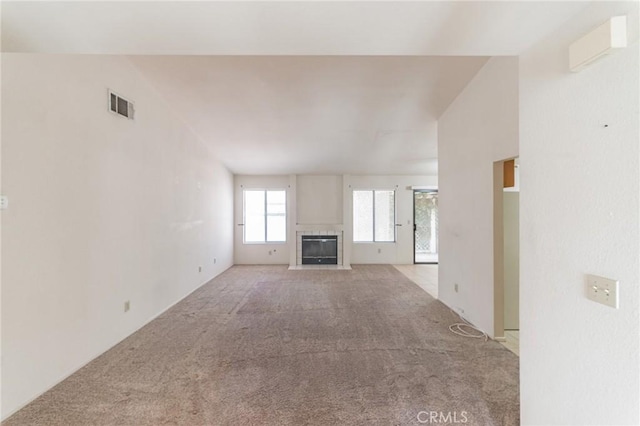 1434 Senator Way, San Jacinto, CA 92583 - unfurnished living room with carpet floors and a tiled fireplace