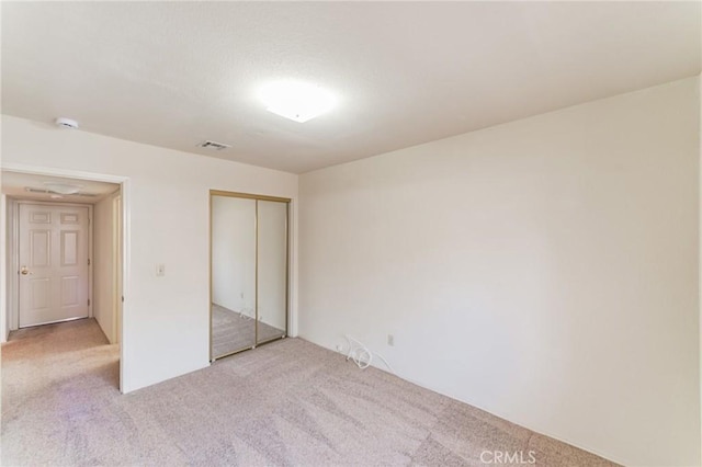 1434 Senator Way, San Jacinto, CA 92583 - unfurnished bedroom with light carpet and a closet