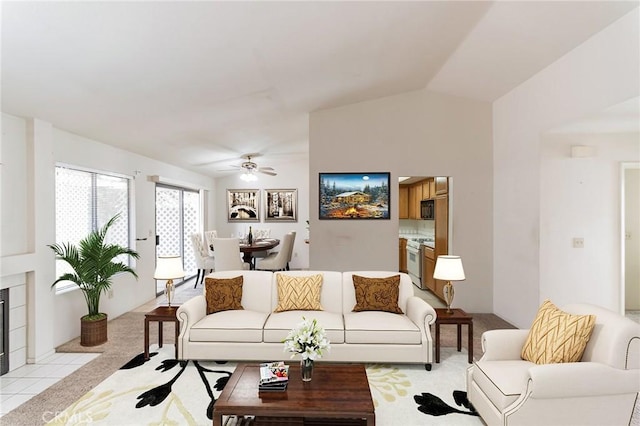 1434 Senator Way, San Jacinto, CA 92583 - living room featuring a ceiling fan, light carpet, and lofted ceiling