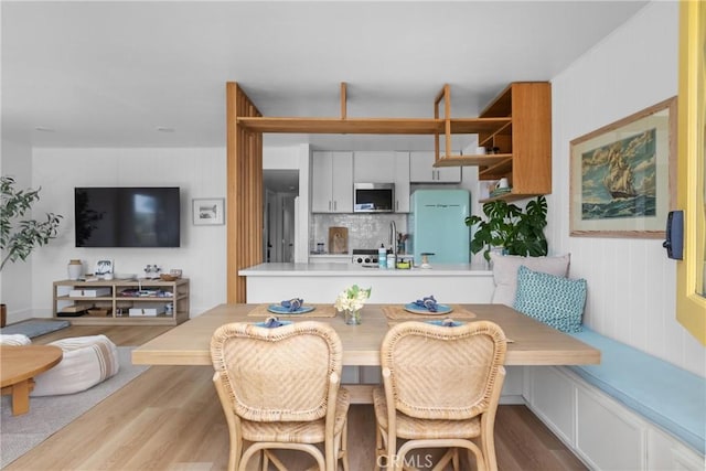 dining room with wood finished floors