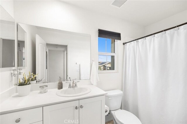 29628 Dotted Mint, Winchester, CA 92596 - bathroom featuring toilet and vanity