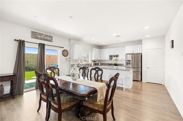 29628 Dotted Mint, Winchester, CA 92596 - dining area featuring light wood-style flooring and recessed lighting