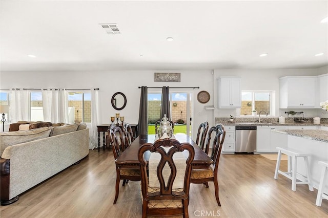 29628 Dotted Mint, Winchester, CA 92596 - dining space featuring light wood-style floors and recessed lighting