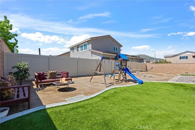 29628 Dotted Mint, Winchester, CA 92596 - view of jungle gym featuring a fire pit and a patio