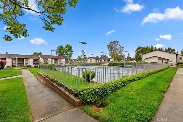 8990 19th St Unit 383, Rancho Cucamonga, CA 91701 - view of home's community featuring a residential view and a pool