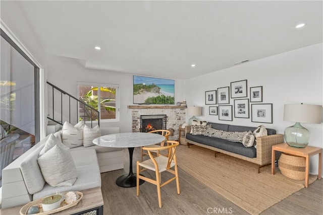 35581 Beach Rd, Dana Point, CA 92624 - living area featuring wood finished floors, a fireplace, stairs, and recessed lighting