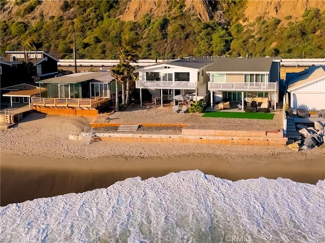 35581 Beach Rd, Dana Point, CA 92624 - rear view of property with a wooded view