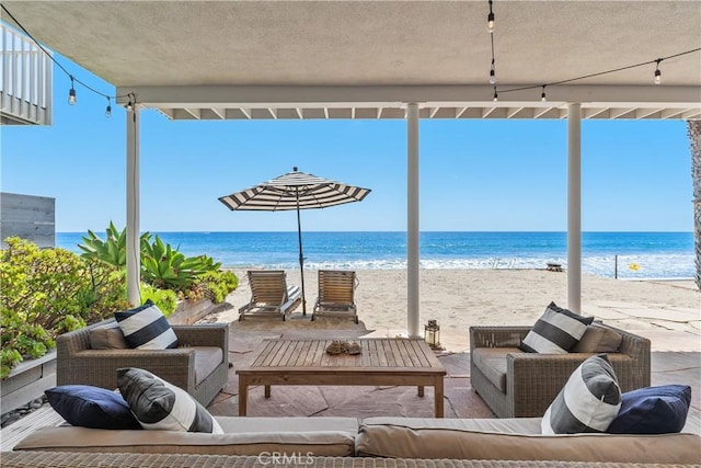 35581 Beach Rd, Dana Point, CA 92624 - view of patio featuring outdoor lounge area and view of water and beach