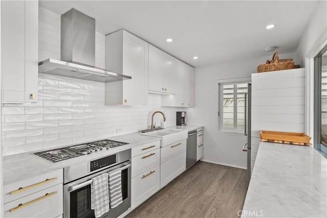 35581 Beach Rd, Dana Point, CA 92624 - kitchen with wall chimney range hood, gas cooktop, wall oven, stainless steel dishwasher, and dark wood-style floors