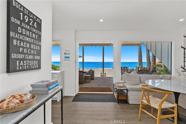 35581 Beach Rd, Dana Point, CA 92624 - living area featuring a water view, wood finished floors, and recessed lighting
