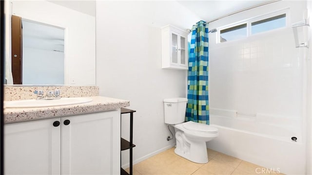 3261 James Ct, Lancaster, CA 93535 - full bath featuring toilet, vanity, tile patterned flooring, shower / bathtub combination with curtain, and baseboards