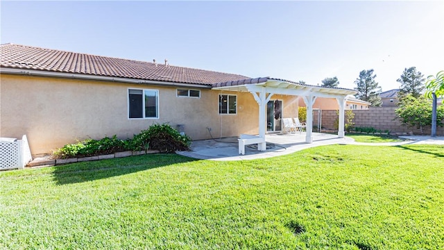 3261 James Ct, Lancaster, CA 93535 - rear view of house with a pergola, a patio area, stucco siding, and a tiled roof