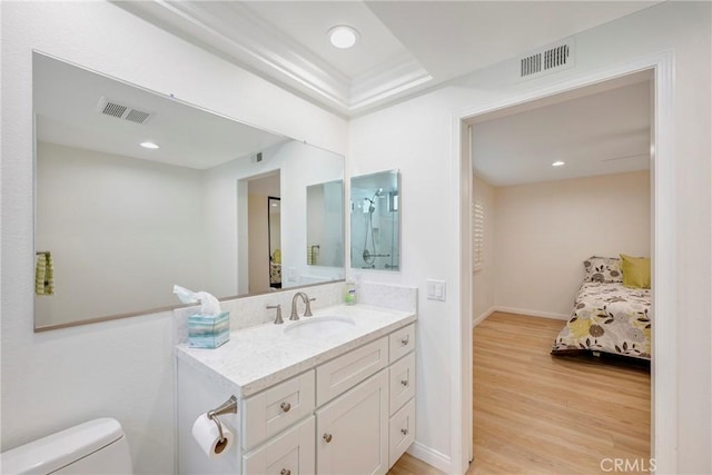 5110 Via Donaldo, Yorba Linda, CA 92886 - bathroom featuring vanity, wood finished floors, toilet, recessed lighting, and ensuite bathroom