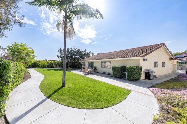 5110 Via Donaldo, Yorba Linda, CA 92886 - view of home's exterior featuring stucco siding, a patio area, and a tile roof
