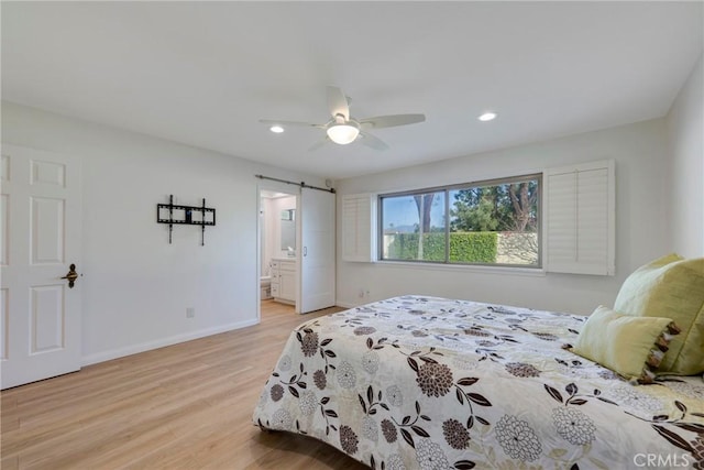 5110 Via Donaldo, Yorba Linda, CA 92886 - bedroom with light wood-style flooring, a barn door, baseboards, recessed lighting, and ceiling fan