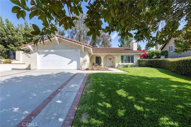 5110 Via Donaldo, Yorba Linda, CA 92886 - mediterranean / spanish-style house with stucco siding, a front yard, a tile roof, driveway, and a garage
