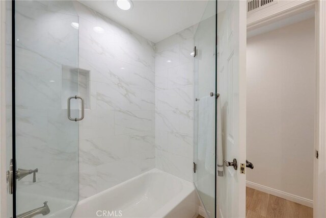 5110 Via Donaldo, Yorba Linda, CA 92886 - bathroom with enclosed tub / shower combo and wood finished floors