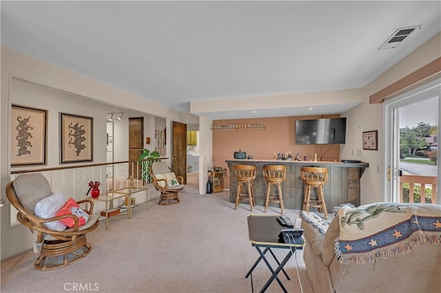 23316 Gray Fox Dr, Canyon Lake, CA 92587 - carpeted living area with bar with sink